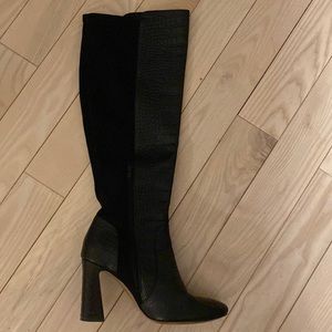 Vincent Cambuto black knee high boots.